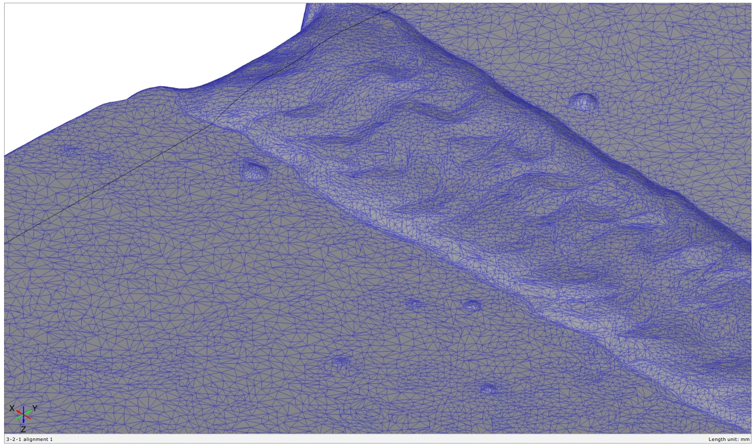 Raw scanned weld surface mesh with small holes and irregularities